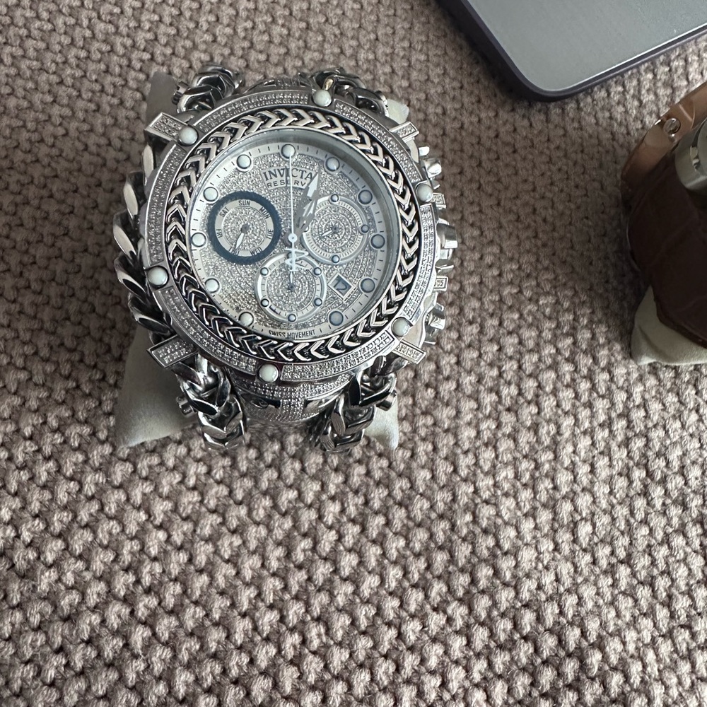 Invicta Silver Classic Watch with Intricate Design